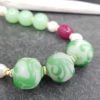 Glass pearls gold green necklace