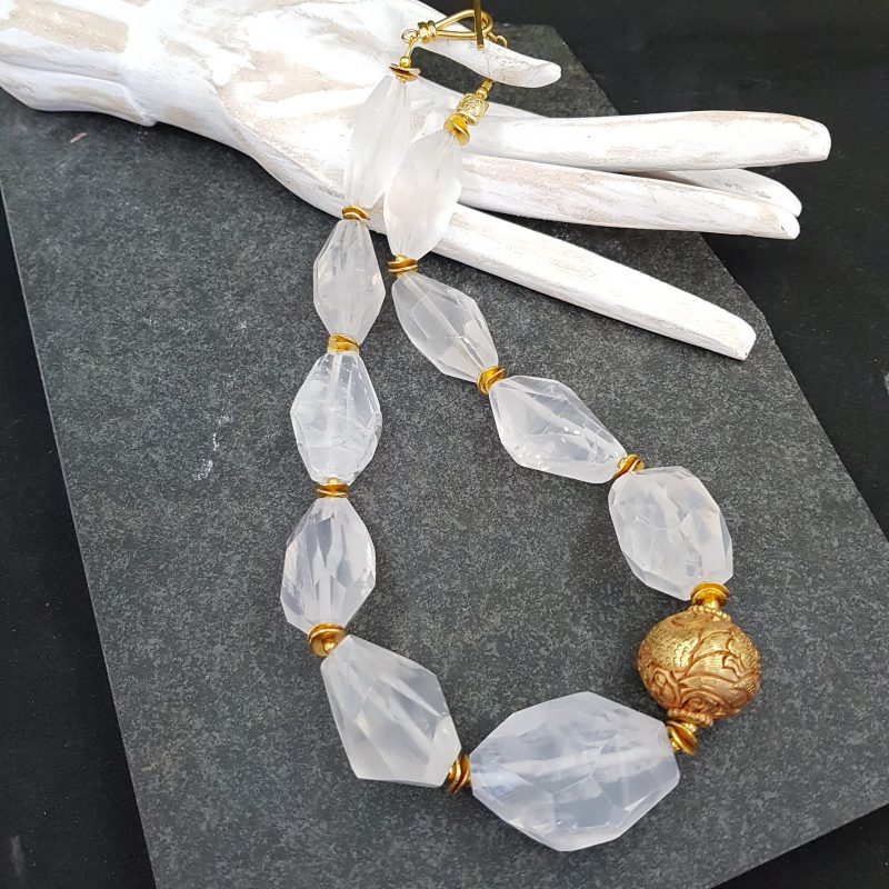Crystal quartz with goldwash bead