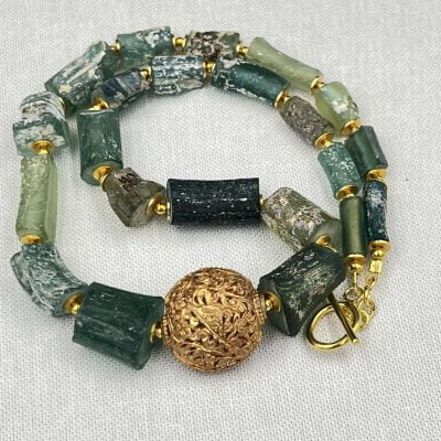 Roman glass repousse necklace